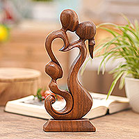Wood sculpture Loving Family Indonesia