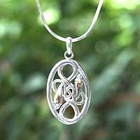 Sterling silver pendant necklace, 'Intertwined' - Sterling silver pendant necklace