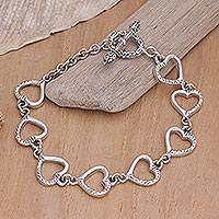 Sterling Silver heart bracelet, 'Story of Love' - Sterling Silver heart bracelet