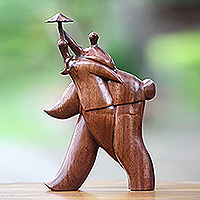 Wood sculpture Guardian Umbrella Indonesia
