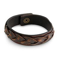Men's distressed leather bracelet, 'Sumatra Journeys' - Men's Handcrafted Leather Braided Bracelet