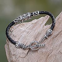Sterling silver and leather braided bracelet,