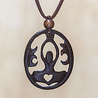 Coconut shell pendant necklace, 'Sukhasana Yoga' - Artisan Crafted Coconut Shell Pendant Necklace