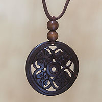 Coconut shell pendant necklace, 'Four Flowers' - Coconut shell pendant necklace