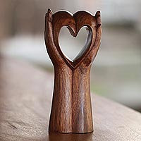 Wood sculpture Faithful Heart Indonesia