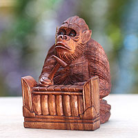 Wood statuette Orangutan Plays the Gangsa Indonesia