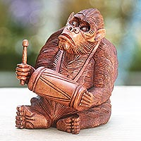 Wood statuette Orangutan Plays the Kendhang Indonesia