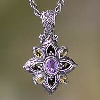 Citrine and amethyst flower necklace, 'Jasmine Shield' - Floral Sterling Silver Necklace with Citrine and Amethyst
