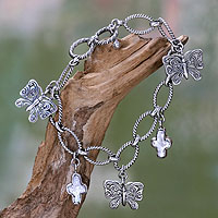 Cultured pearl charm bracelet, 'Monarch Cross' - Cultured Pearl and Silver Butterfly Charm Bracelet