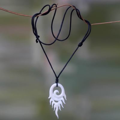 Bone pendant necklace, 'Swirling Flame' - Hand Carved Cow Bone Pendant Necklace from Bali