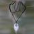 Bone pendant necklace, 'Swirling Flame' - Hand Carved Cow Bone Pendant Necklace from Bali thumbail