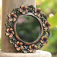 Wood wall mirror, 'Plumeria Garland' - Round Floral Wall Mirror Hand Carved from Wood
