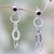 Garnet dangle earrings, 'Peace Circles' - Peace Symbol Hand Crafted Garnet and Silver Dangle Earrings thumbail