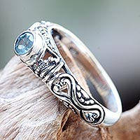 Blue topaz solitaire ring, 'Hearts Connected' - Blue Topaz Artisan Crafted Bali Silver Solitaire Ring