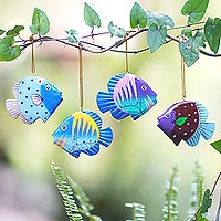 Wood ornaments, 'Rainbow Fish' (set of 4) - Artisan Crafted Wood Fish Ornaments from Bali (Set of 4)