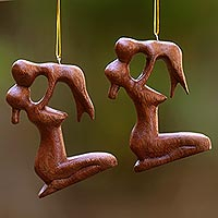 Wood ornaments, 'Gentle Touch of a Mother' (pair) - Playful Mother and Baby Ornaments Hand Carved Wood (Pair)
