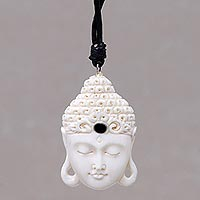 Bone pendant necklace, 'White Buddha Head' - Buddha Head Cow Bone Pendant on Adjustable Leather Cord