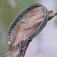 Sterling silver bracelet, 'Tukad Pakerisan' - Balinese Braided Sterling Silver Bracelet with Toggle Clasp