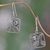 Blue topaz dangle earrings, 'Bali Daisy' - Handcrafted Indonesian Silver Blue Topaz Dangle Earrings thumbail