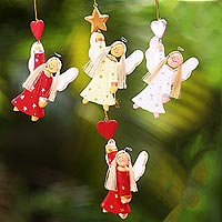 Wood ornaments, 'Dream Angels' (set of 4) - Artisan Crafted Set of 4 Wood Angel Ornaments from Bali