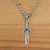 Men's garnet pendant necklace, 'Sword of Peace' - Handcrafted Men's Silver and Garnet Peace Theme Necklace thumbail
