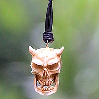Bone and leather necklace, 'Demon King' - Handmade Cow Bone and Leather Devil Skull Necklace from Bali