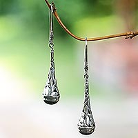 Onyx dangle earrings, 'Gleaming Paddy' - Handmade Onyx and Sterling Silver Earrings from Indonesia