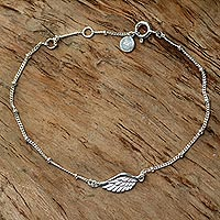 Sterling silver pendant bracelet, 'One-Winged Angel' - Handmade Sterling Silver Pendant Bracelet from Indonesia