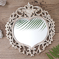 Wood wall mirror, 'Wild Heart' - Hand Carved Wood Heart Shaped Wall Mirror from Indonesia