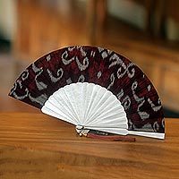 Cotton and mahogany wood fan,