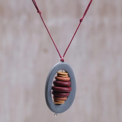 Polymer clay and resin pendant necklace, Center of All Things