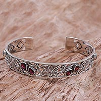 Garnet cuff bracelet, 'Red Dewdrops' - Feminine Garnet and Sterling Silver Cuff Bracelet from Bali