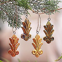 Wood ornaments, 'Festive Fleur-de-Lis' (set of 4) - Four Gold Tone Albesia Wood Ornaments by Balinese Artisans