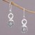 Blue topaz dangle earrings, 'Blue Tangle' - Blue Topaz and Sterling Silver Looping Earrings from Bali thumbail