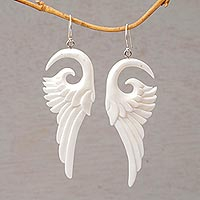 Bone dangle earrings, 'Swirling Wings' - Handcrafted Bone Wing-Shaped Dangle Earrings from Bali