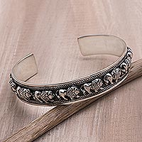 Sterling silver cuff bracelet, 'Lion Parade' - Sterling Silver Lion Motif Cuff Bracelet from Bali