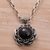 Onyx pendant necklace, 'Midnight Lotus' - Handmade Onyx and Sterling Silver Floral Pendant Necklace thumbail