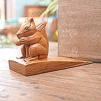 Wood doorstop, 'Helpful Squirrel in Brown' - Handcrafted Wood Squirrel Doorstop in Brown from Bali