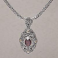 Gold accent garnet pendant necklace,