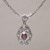 Gold accented garnet pendant necklace, 'Floral Dew' - Gold Accented Garnet Floral Pendant Necklace from Bali thumbail