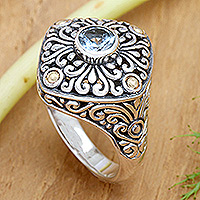 Gold-accented blue topaz cocktail ring, 'Swirling Facade' - Gold-accented Blue Topaz Swirl Motif Cocktail Ring from Bali