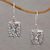 Gold accented blue topaz dangle earrings, 'Faith Pebbles' - Gold Accent Blue Topaz Cross Dangle Earrings from Bali thumbail