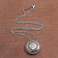 Sterling silver pendant necklace, 'Hidden Eden' - Circular Sterling Silver Pendant Necklace from Bali