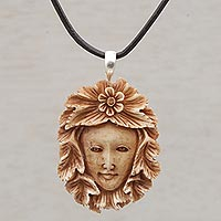 Bone pendant necklace, 'Spying Jaka Tarub' - Handcrafted Floral Bone Pendant Necklace from Bali