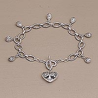 Sterling silver charm bracelet, 'The Garden in my Heart' - Romantic Sterling Silver Link Bracelet with Heart Charm