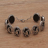 Onyx link bracelet, 'Cockatoo Garden' - Onyx and Sterling Silver Link Bracelet with Cockatoo Motif