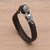 Leather wristband bracelet, 'Buffalo Bravery' - Black Leather and Sterling Silver Braided Wristband thumbail