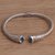 Blue topaz cuff bracelet, 'Gleaming Twist' - Swirl Motif Blue Topaz Cuff Bracelet from Bali thumbail