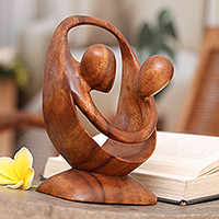 Wood sculpture Cycle of Love Indonesia