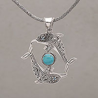 Blue topaz pendant necklace, 'Dolphin Harmony' - Sterling Silver Reconstituted Turquoise Dolphin Necklace